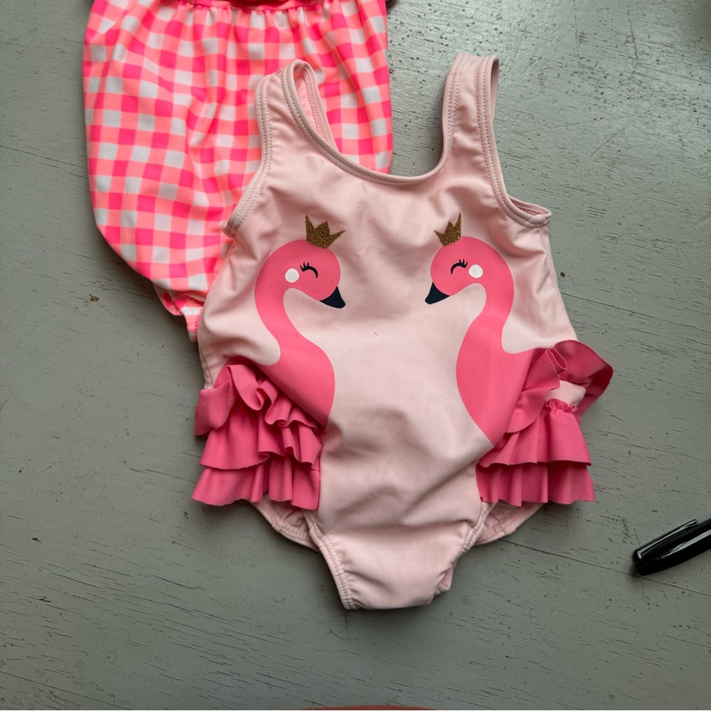 Set 2 /bathing suits pink and white checked 3-6mos. flamingo  6 mos.No stains